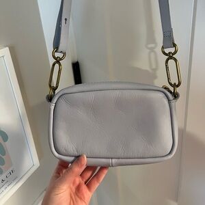 NWOT Madewell Carabiner crossbody bag. Sky blue leather, brass hardware.